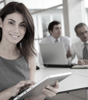 Executive woman working on electronic tab